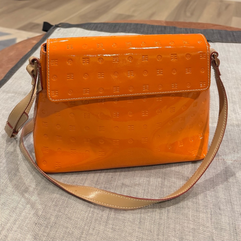 Arcadia Monogram Embossed Patent Leather Shoulder Crossbody Bag in Orange